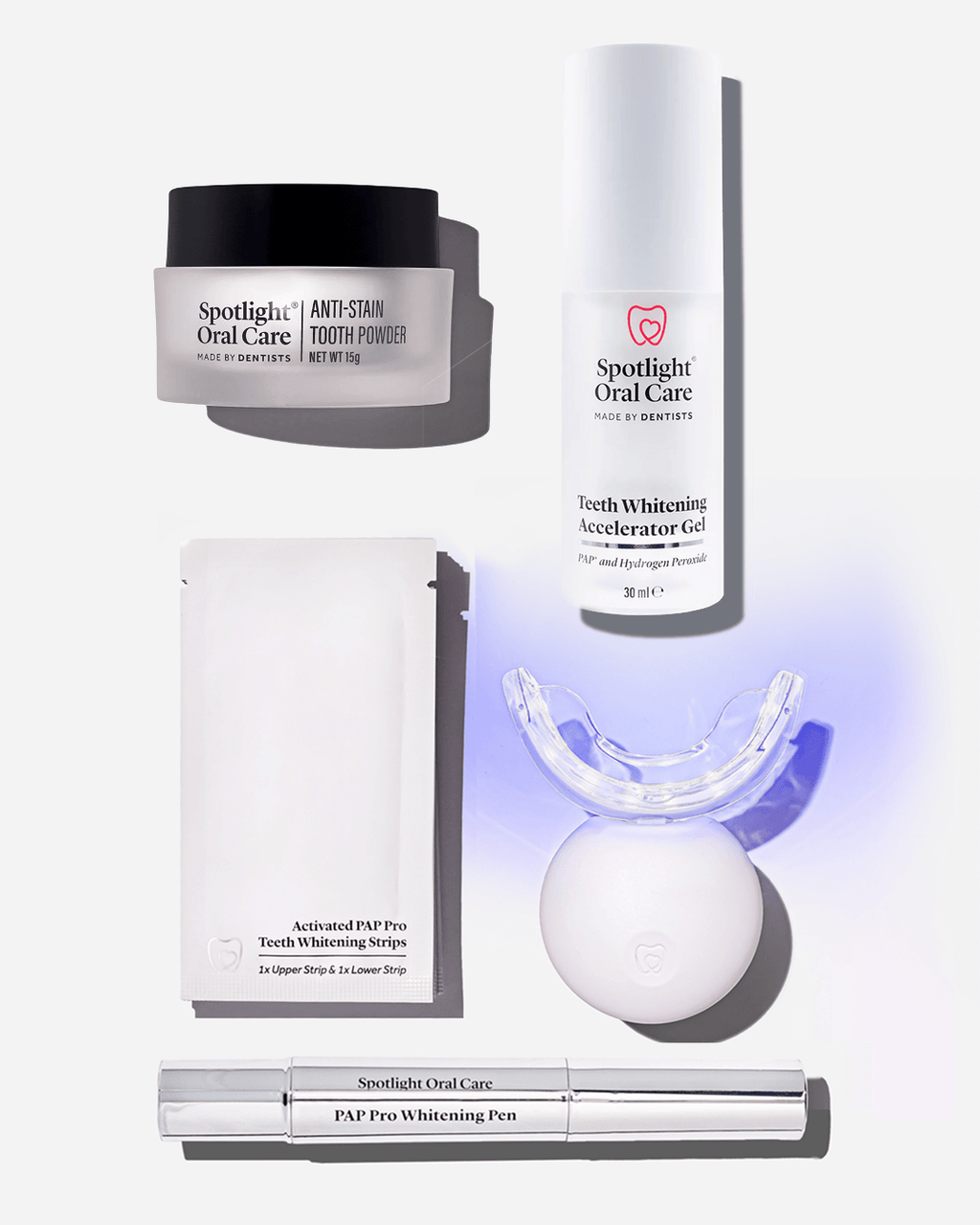Spotlight Oral Care Bright and White Bundle featuring Professional LED Teeth Whitening System, Anti-Stain Tooth Powder, Teeth Whitening Pen, Whitening Strips, and Accelerator Gel​