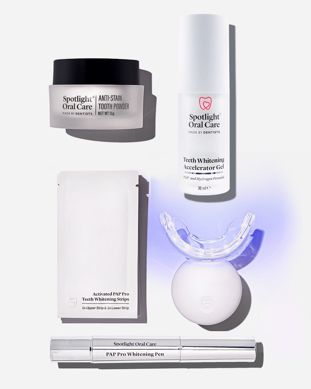 Spotlight Oral Care Bright and White Bundle featuring Professional LED Teeth Whitening System, Anti-Stain Tooth Powder, Teeth Whitening Pen, Whitening Strips, and Accelerator Gel​