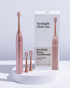 Spotlight Oral Care’s Rose Gold Sonic Toothbrush combining professional-level cleaning with a sleek, stylish design