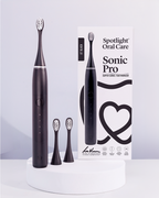 Jet Black Sonic Pro Toothbrush equipped with a visual quadrant timer and micro point tongue cleaner for comprehensive oral hygiene ​