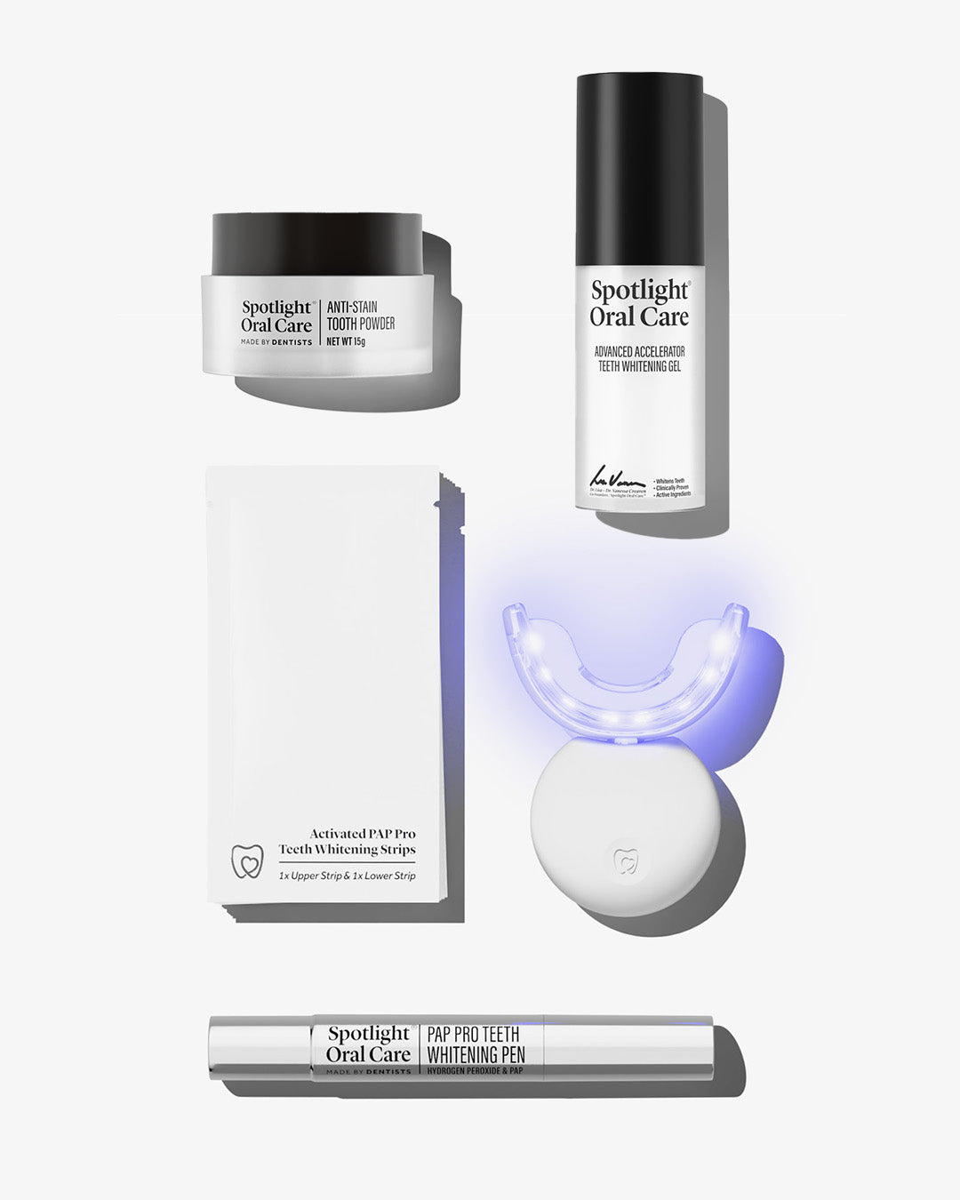 Spotlight Oral Care Bright and White Bundle featuring Professional LED Teeth Whitening System, Anti-Stain Tooth Powder, Teeth Whitening Pen, Whitening Strips, and Accelerator Gel​