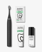 Spotlight Oral Care Sonic Pro Starter Bundle in Jet Black featuring electric toothbrush, whitening strips, accelerator gel, and professional toothpaste​