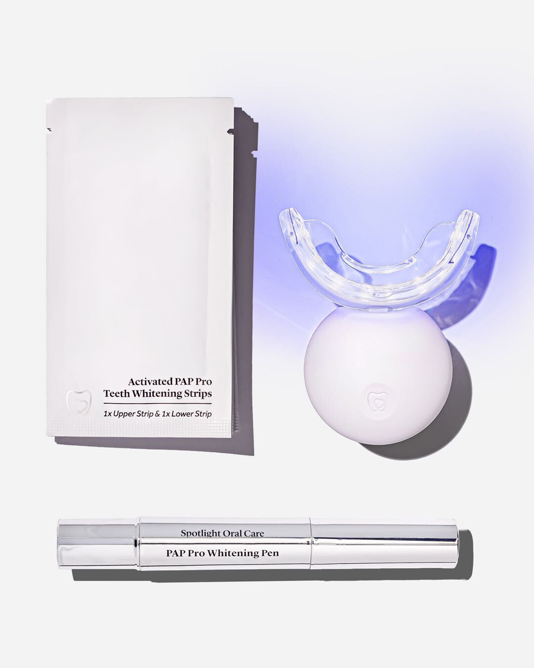 Spotlight Oral Care Professional LED Teeth Whitening System featuring dual-action red and blue light technology to break down stains and rejuvenate gums​