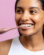 Dentist-developed electric toothbrush in rose gold designed to target cavities, bad breath, and staining for improved oral health​