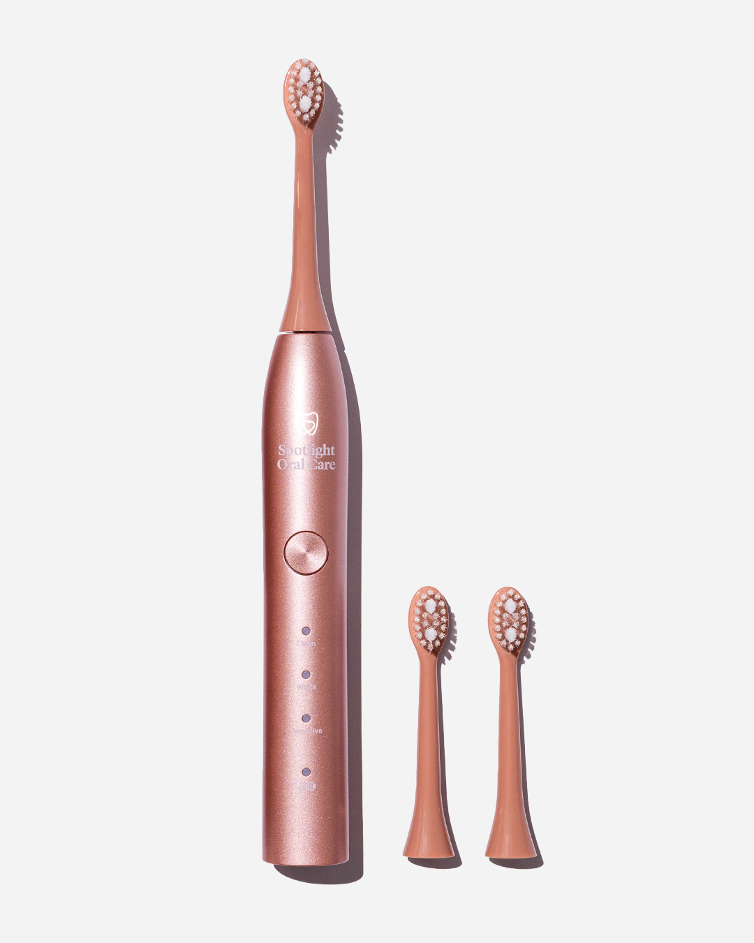 Spotlight Oral Care Rose Gold Sonic Electric Toothbrush featuring three brushing modes—Sensitive, Clean, and White—for a personalized oral care routine​