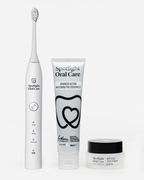 Triple Action Whitening set including toothpaste, electric toothbrush, and anti-stain tooth powder