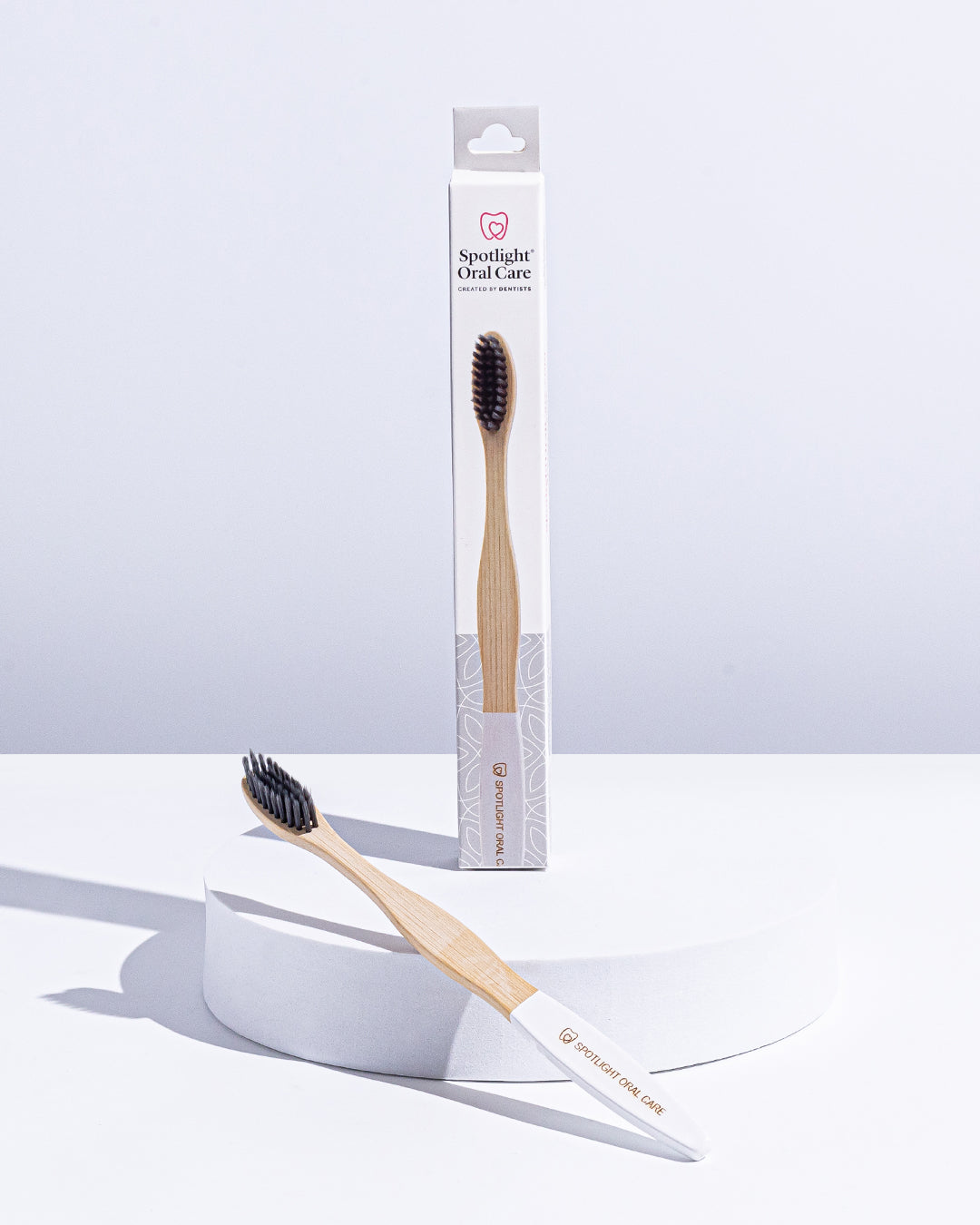 Spotlight Oral Care's sustainable bamboo toothbrush combining natural materials with effective cleaning performance​