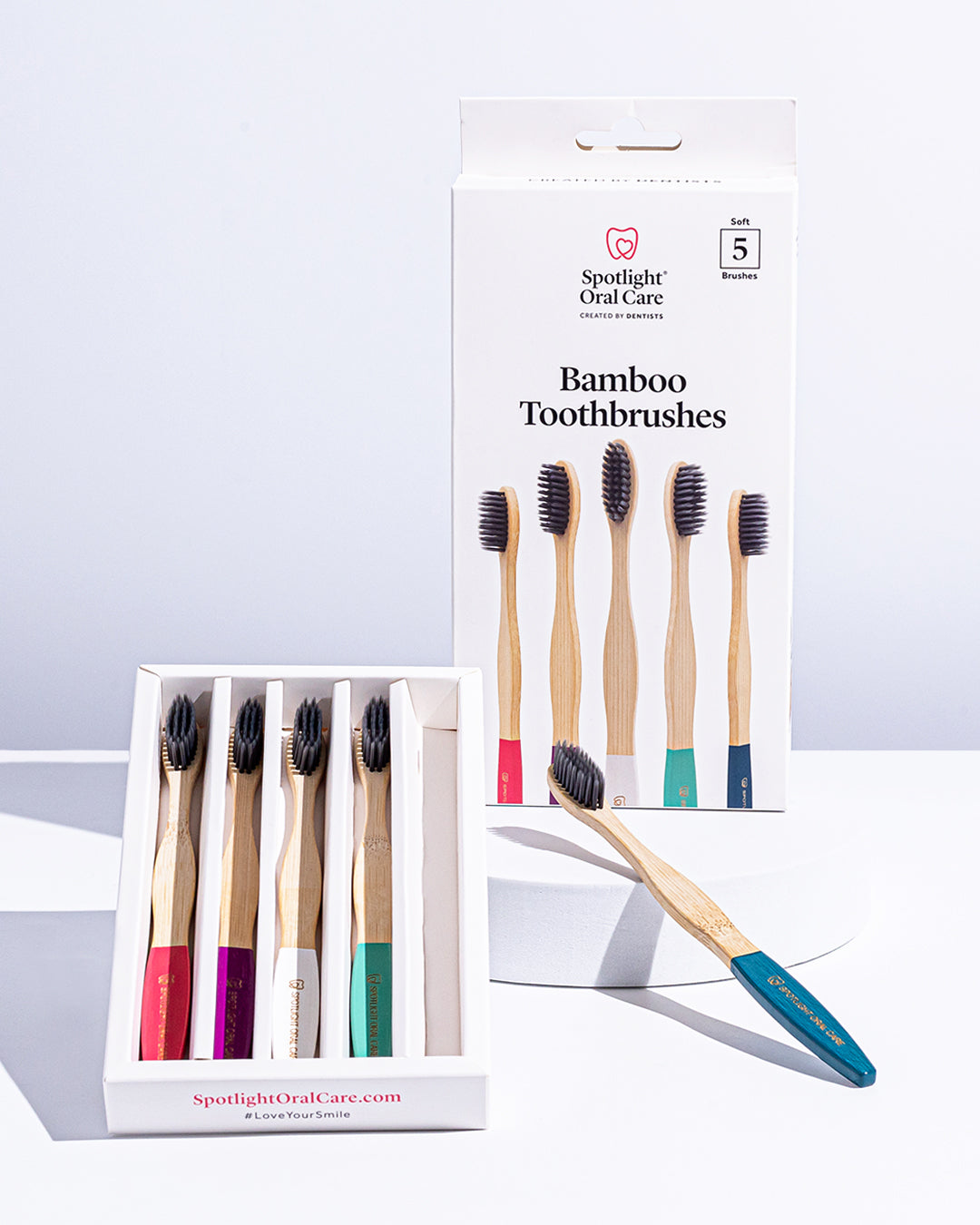 Colourful bamboo toothbrush set designed to reduce plastic waste while maintaining oral hygiene, perfect for environmentally conscious families​