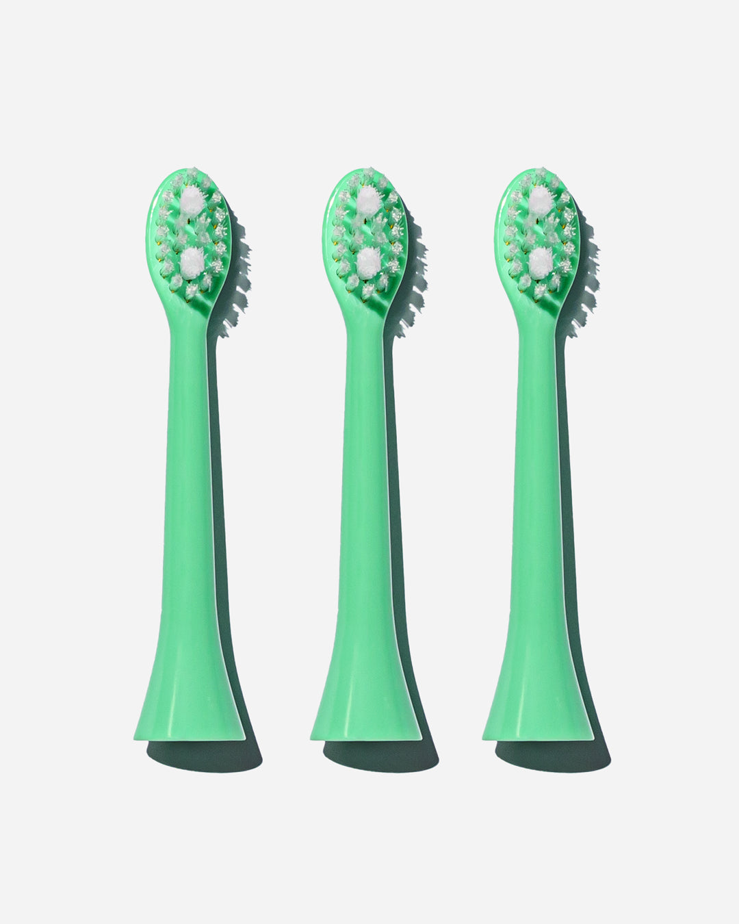 Spotlight Oral Care Sonic Toothbrush Replacement Heads in Coral Green, designed exclusively for the Sonic Toothbrush to ensure optimal cleaning performance​
