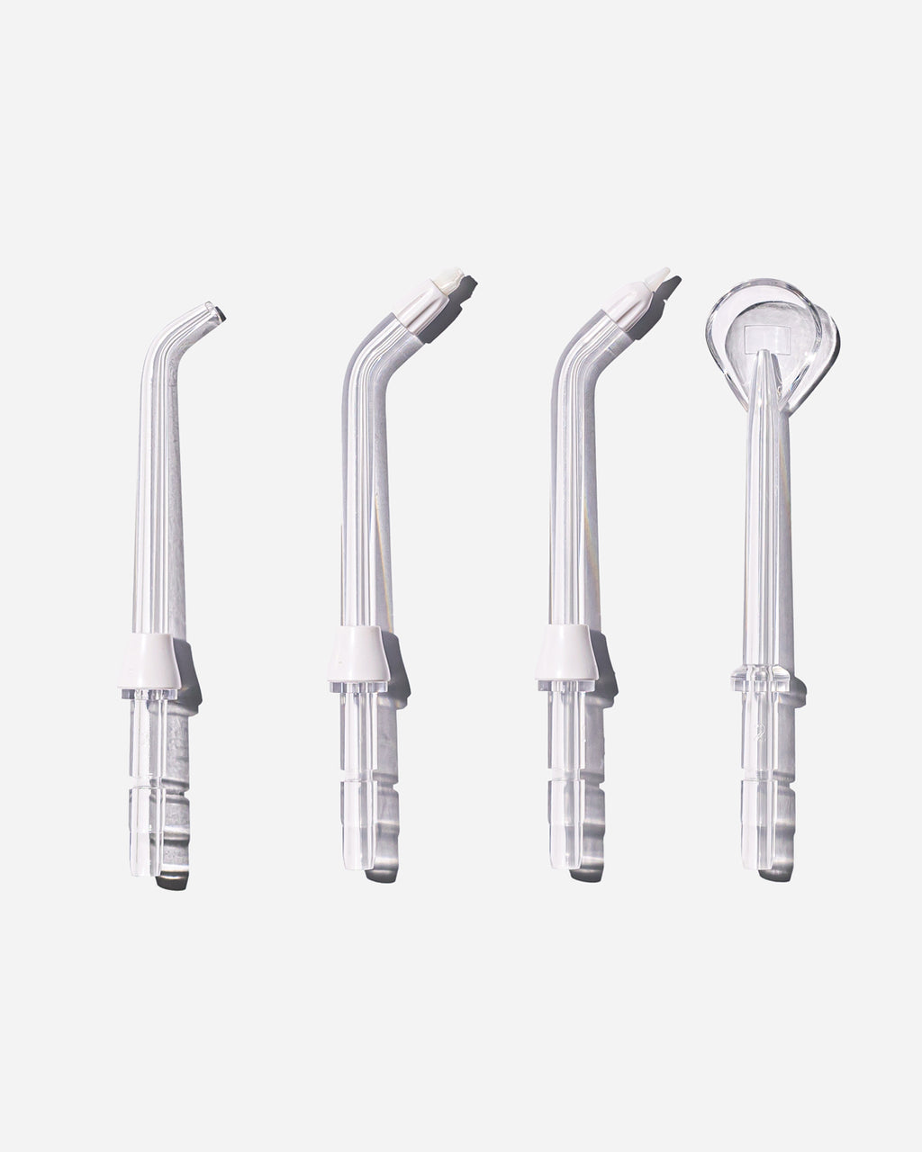 Spotlight Oral Care Water Flosser Replacement Tips set including Classic Jet Tip, Orthodontic Spray Tip, Periodontal Pocket Sprinkler, and Tongue Scraper for comprehensive oral hygiene​