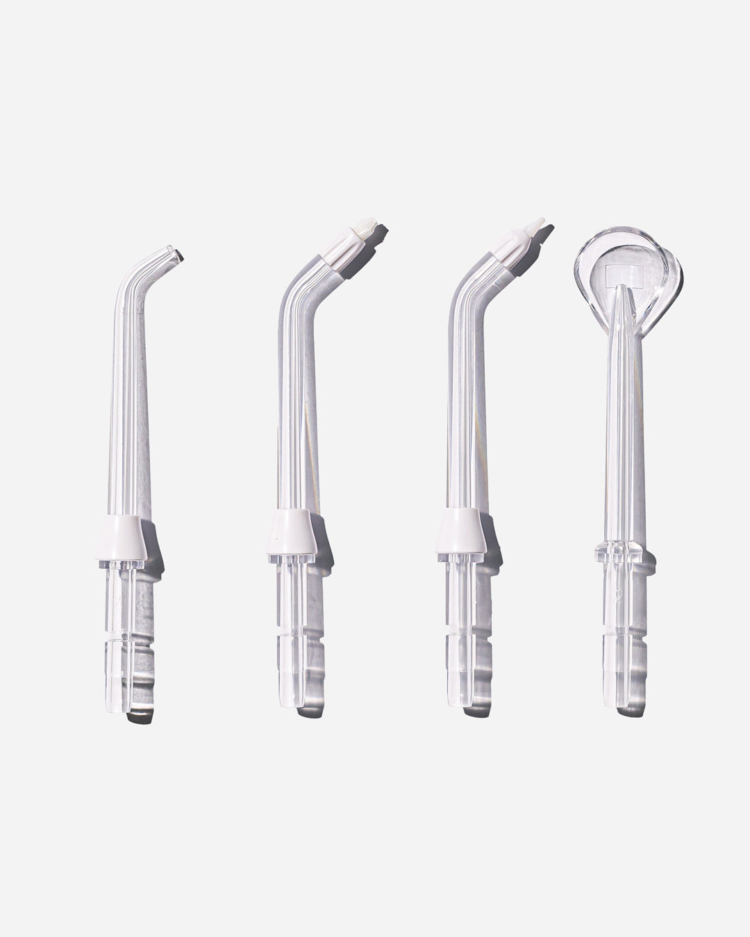 Spotlight Oral Care Water Flosser Replacement Tips set including Classic Jet Tip, Orthodontic Spray Tip, Periodontal Pocket Sprinkler, and Tongue Scraper for comprehensive oral hygiene​