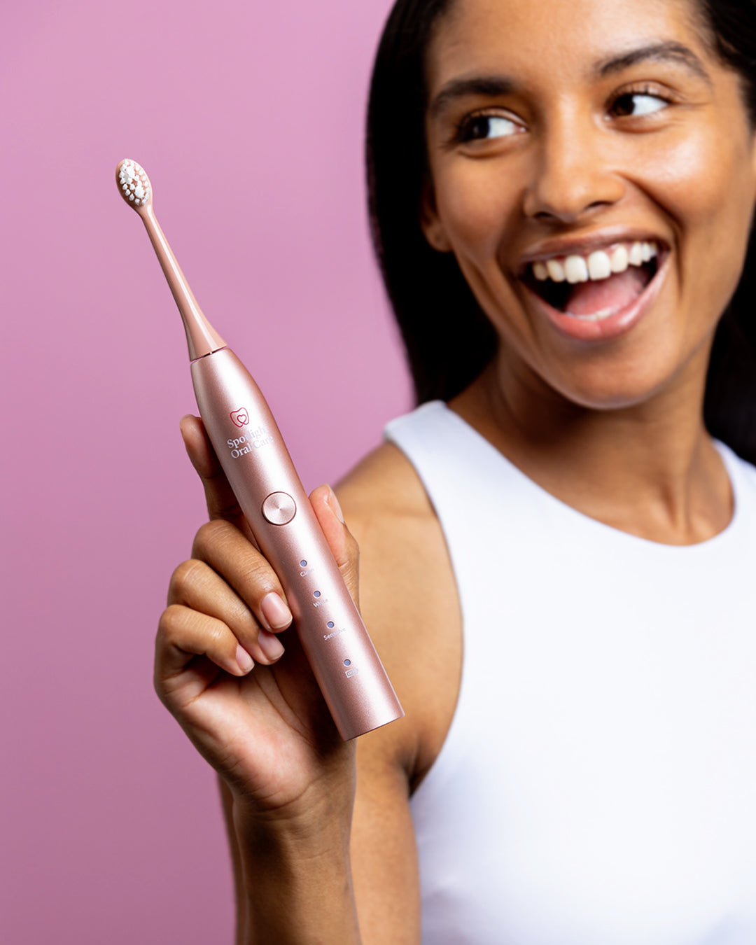 Elegant rose gold sonic toothbrush delivering up to 48,000 reps per minute with a 2-minute self-timer and 30-second interval reminders to ensure thorough cleaning​