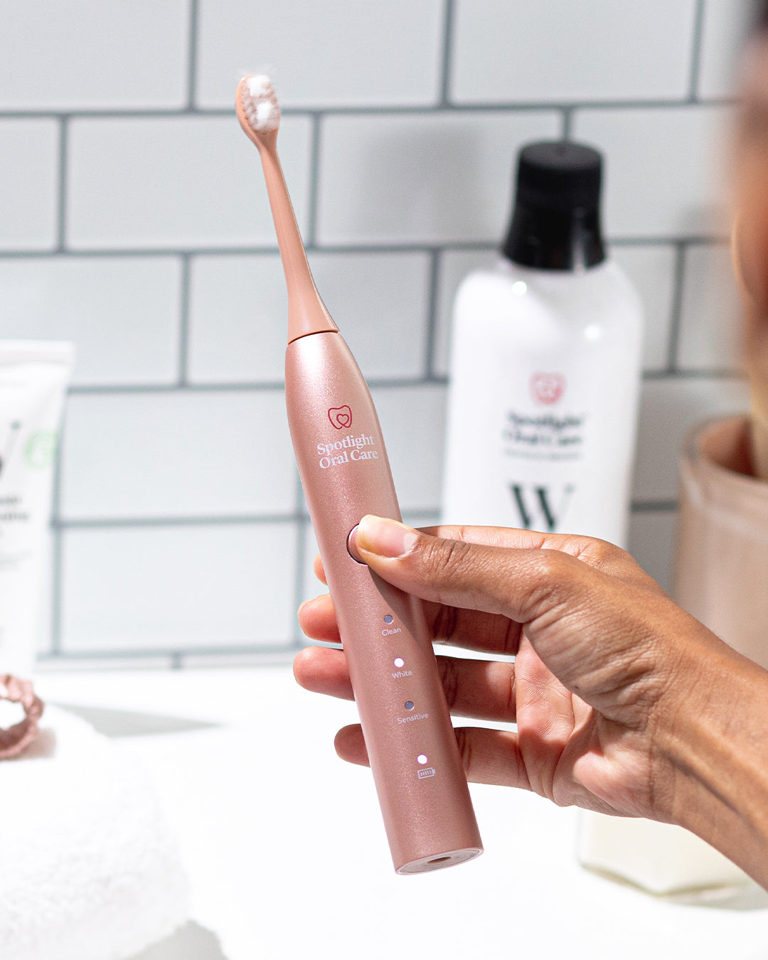 Rechargeable Rose Gold Sonic Toothbrush with up to 70 days of battery life, ideal for both home and travel use